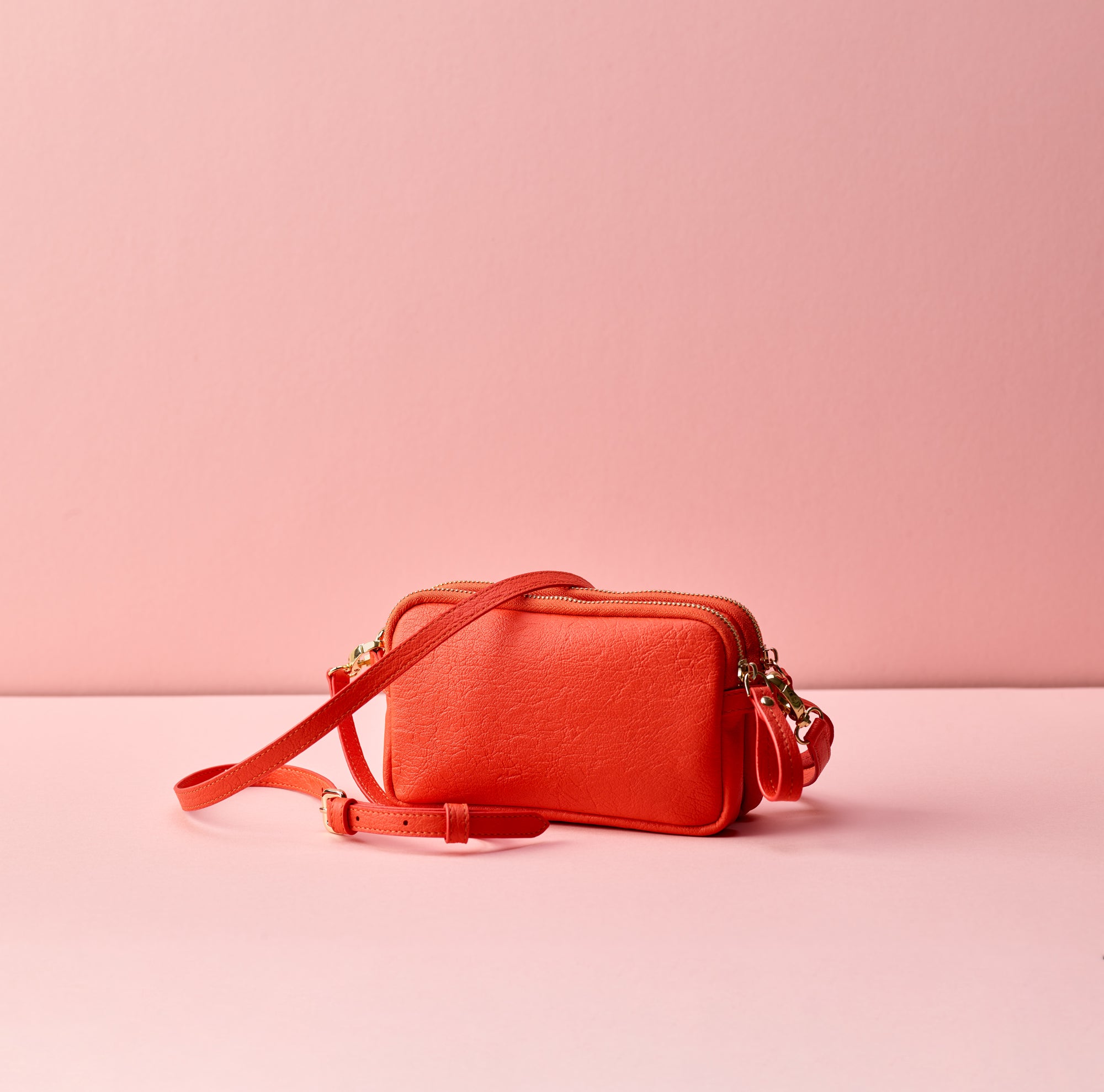 1 zip Flossy cross body bag